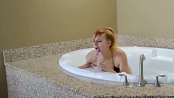 Kesha lookimg deep throats a confetti dildo in the hot tub time machine