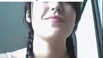 Brunette tape facing cam removes on webcam entertaining through dildo