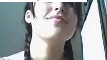 Brunette tape facing cam removes on webcam entertaining through dildo