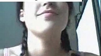 Brunette tape facing cam removes on webcam entertaining through dildo