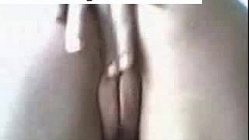 Brunette tape facing cam removes on webcam entertaining through dildo