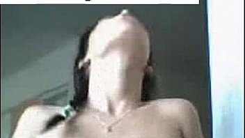 Brunette tape facing cam removes on webcam entertaining through dildo