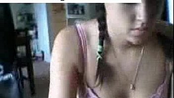 Brunette tape facing cam removes on webcam entertaining through dildo