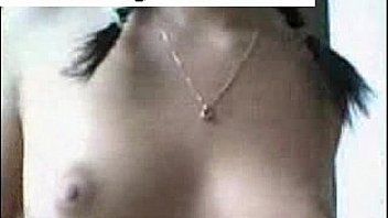 Brunette tape facing cam removes on webcam entertaining through dildo