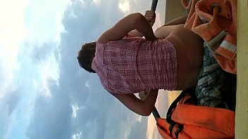 Blond stud ravishing his tanned woman in a rubber boat