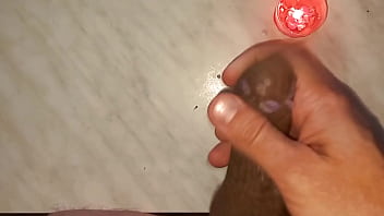 I drip wax onto my long tattooed foreskin which makes me aroused and my penis gets hard