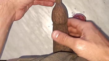 I drip wax onto my long tattooed foreskin which makes me aroused and my penis gets hard