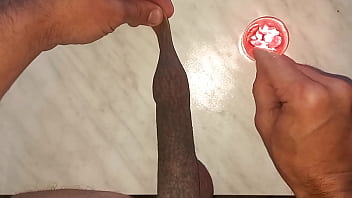 I drip wax onto my long tattooed foreskin which makes me aroused and my penis gets hard