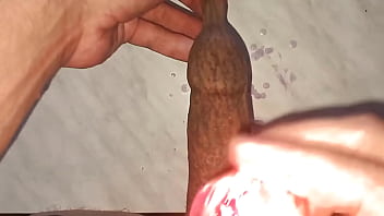 I drip wax onto my long tattooed foreskin which makes me aroused and my penis gets hard