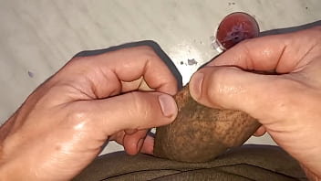 I drip wax onto my long tattooed foreskin which makes me aroused and my penis gets hard