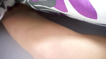 Hot brunette rubs her wet pussy under covers morning