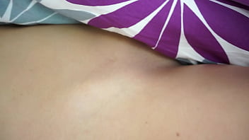 Hot brunette rubs her wet pussy under covers morning