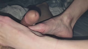 Wife play with cock with feet