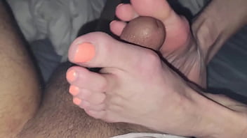 Wife play with cock with feet