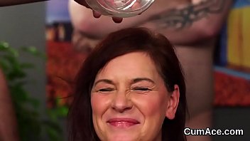 Horny honey gets jizz load on her face eating all the jizz