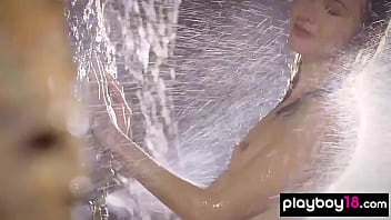 Petite brunette hottie showering her juicy shaved pussy