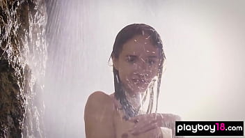 Petite brunette hottie showering her juicy shaved pussy