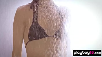 Petite brunette hottie showering her juicy shaved pussy