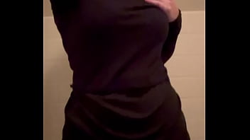 Claire taking off work clothes