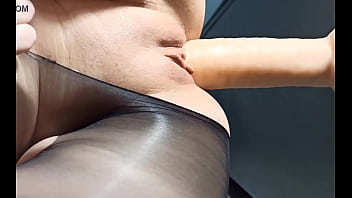 Sexy girl squirts from a huge rubber dick