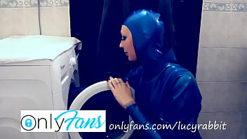 Let's wash laundry dressed in blue latex catsuit