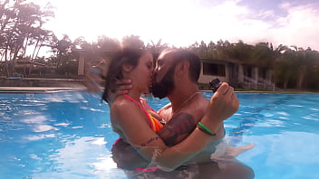 Hot kissing the little bitch in the pool before some wet sex