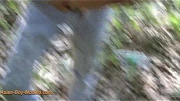 Cute Asian Boy Bound In The Wood thumbnail