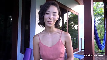 Babe plays with a toy in the bedroom