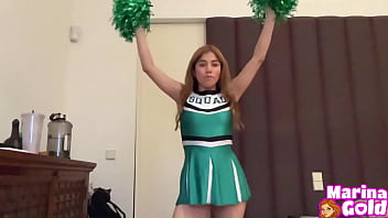 Horny cheerleader masturbates with her fingers until she cums
