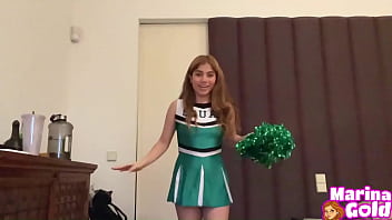 Horny cheerleader masturbates with her fingers until she cums