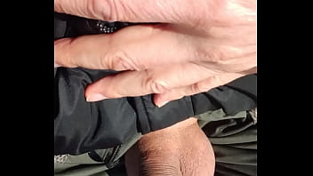 I Take Out My Cock And Pee On A Public Bench Facing The Sea With Buildings Behind Me thumbnail