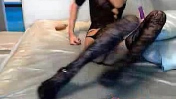 Lola cutie in seductive dress masturbates in both holes with a small dildo