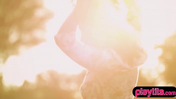 Petite chick having fun outdoors for our viewing pleasure