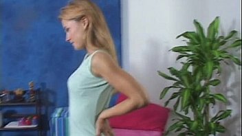 Cute masseuse shows off body