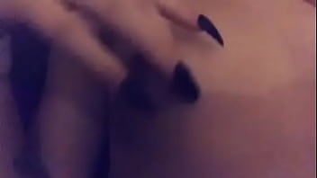 Showing her tits off