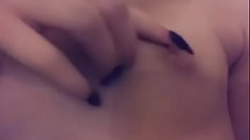 Showing her tits off