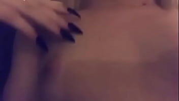 Showing her tits off