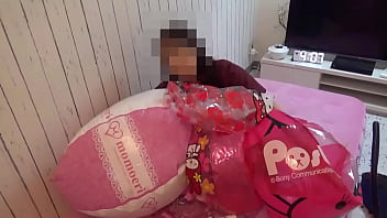 Japanese girl deflating the beachballs