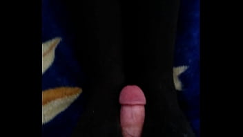 Raven in black nylons lets guy fuck her feet