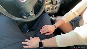 Playing with his cock on parking slot in day time public blowjob