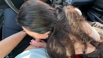 Playing with his cock on parking slot in day time public blowjob