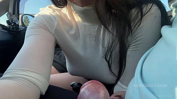 Playing with his cock on parking slot in day time public blowjob