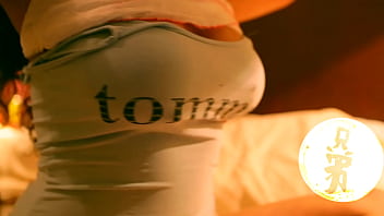 Brunette with huge tits playing with her luscious melons