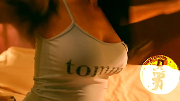 Brunette with huge tits playing with her luscious melons