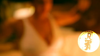 Brunette with huge tits playing with her luscious melons