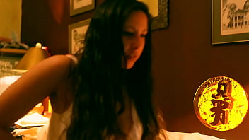 Brunette with huge tits playing with her luscious melons