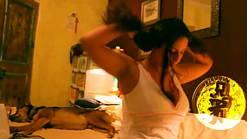 Brunette with huge tits playing with her luscious melons