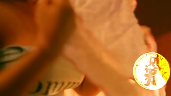 Brunette with huge tits playing with her luscious melons