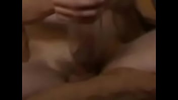 Masturbating with a glass toy