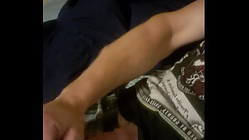 Stroking that hard cock